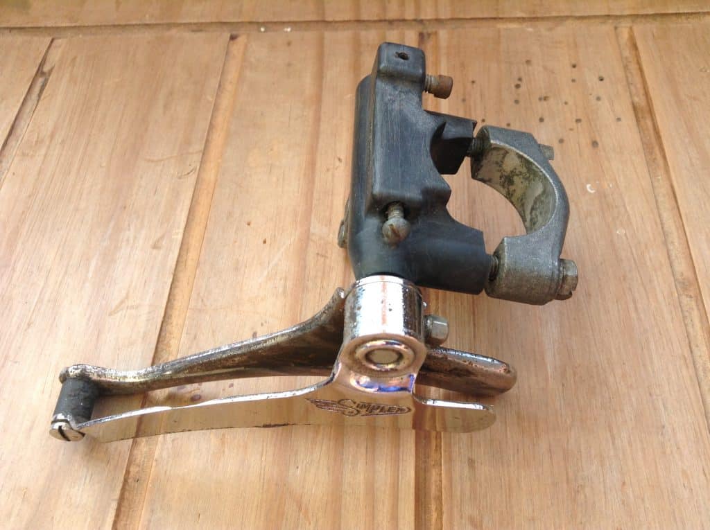 The unrestored derailleur with greying Delrin