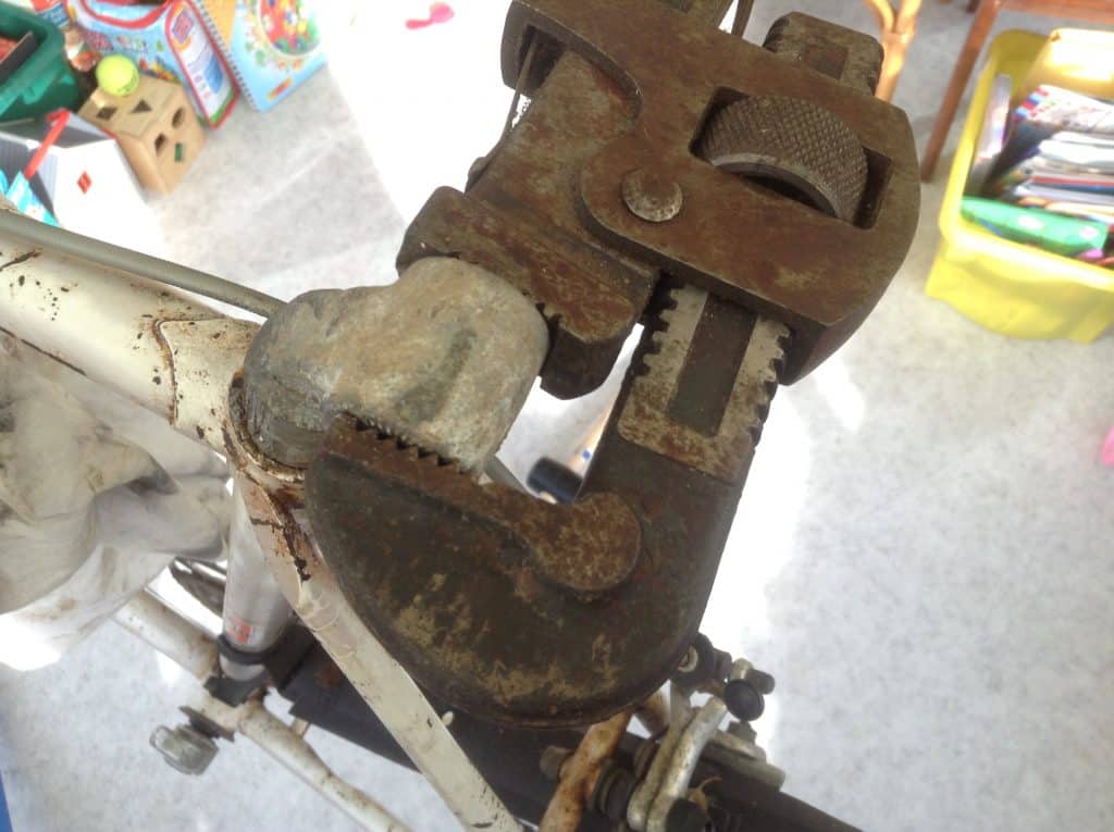 Image of seat post clamped by a wrench