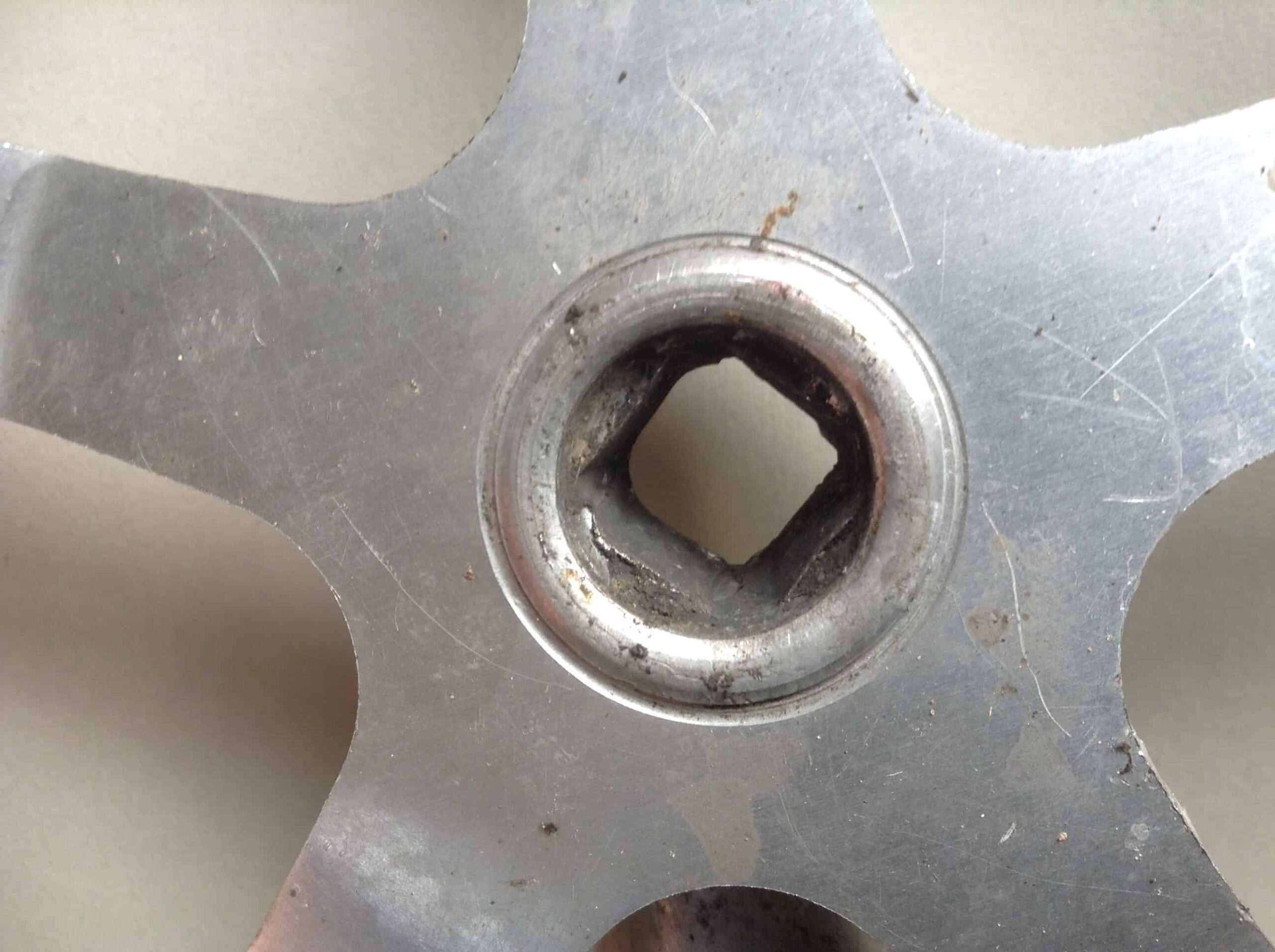 Close up image of irregular bolt hole