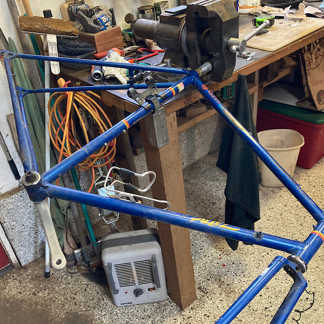 Specialized Allez restoration image of frame and seat post in vice