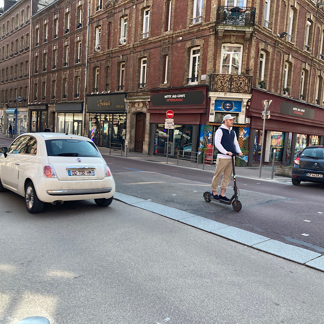Picture of man on electric scooter