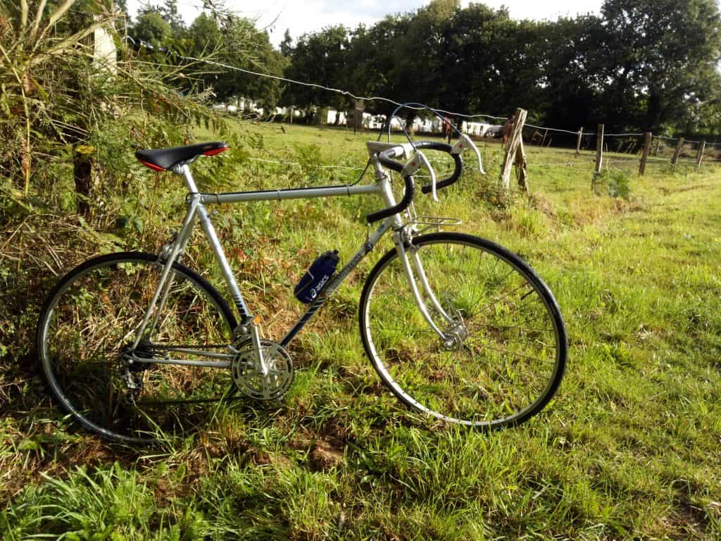 Vintage Motobecane bike in field image