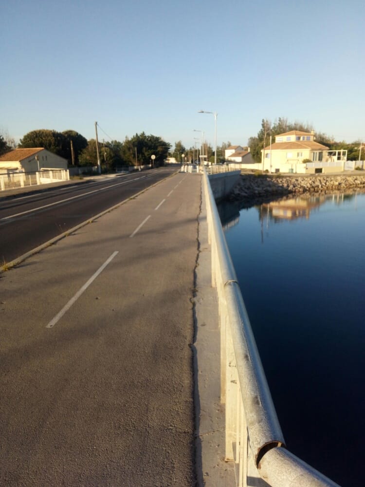 Image if crossing a bridge while cycling on the French Mediterranean