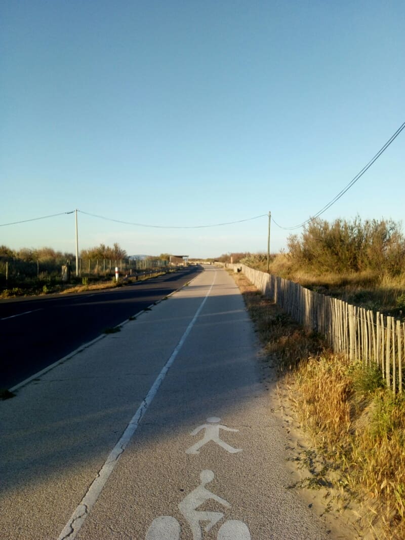 Image of beach bike trail at sunset